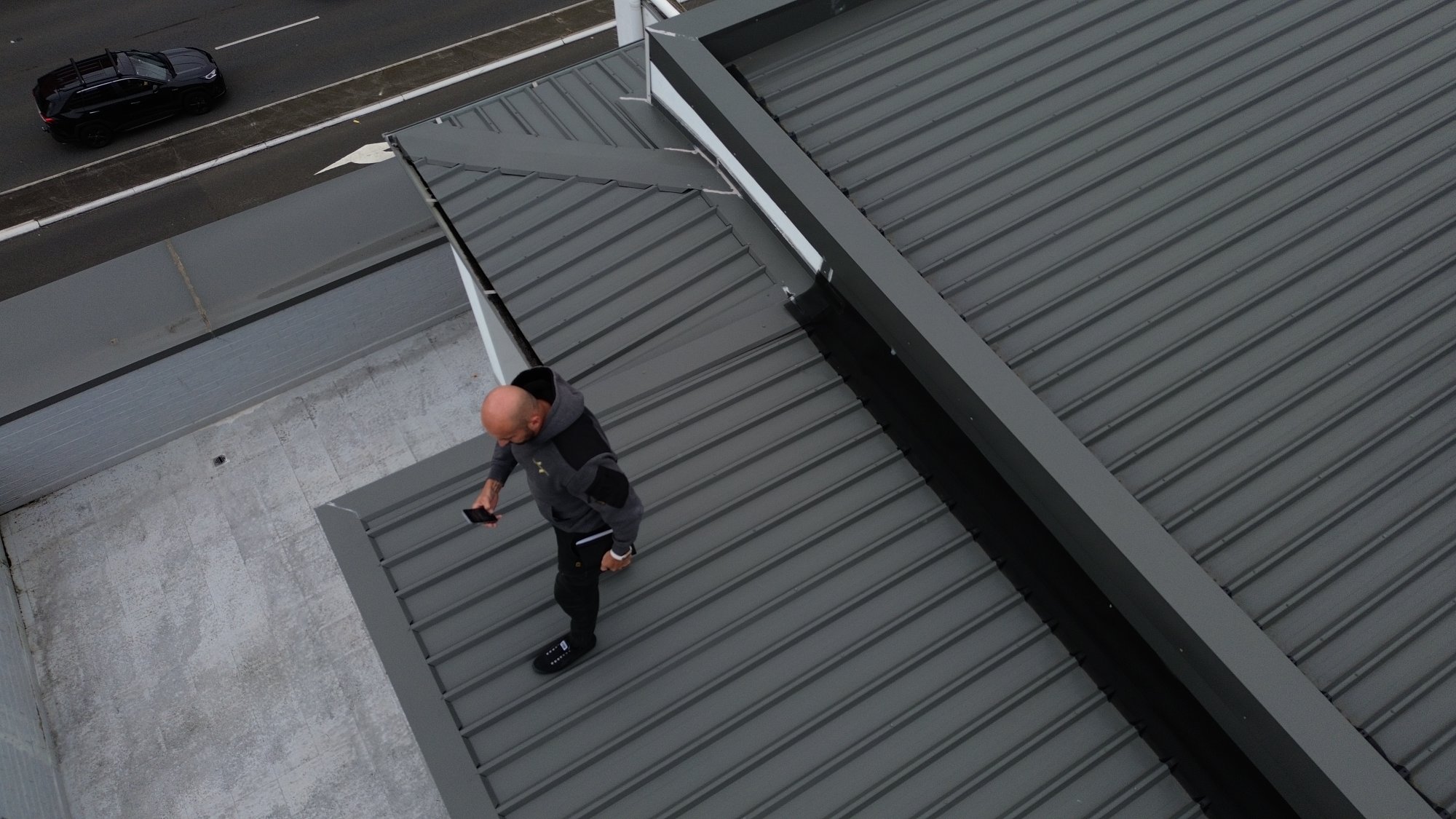 Roof inspector conducting assessment