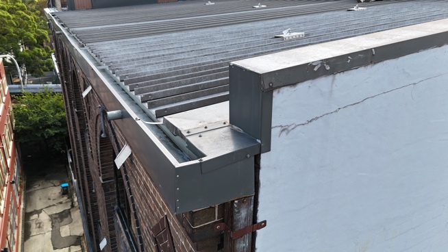 Eaves gutter and downpipe connection